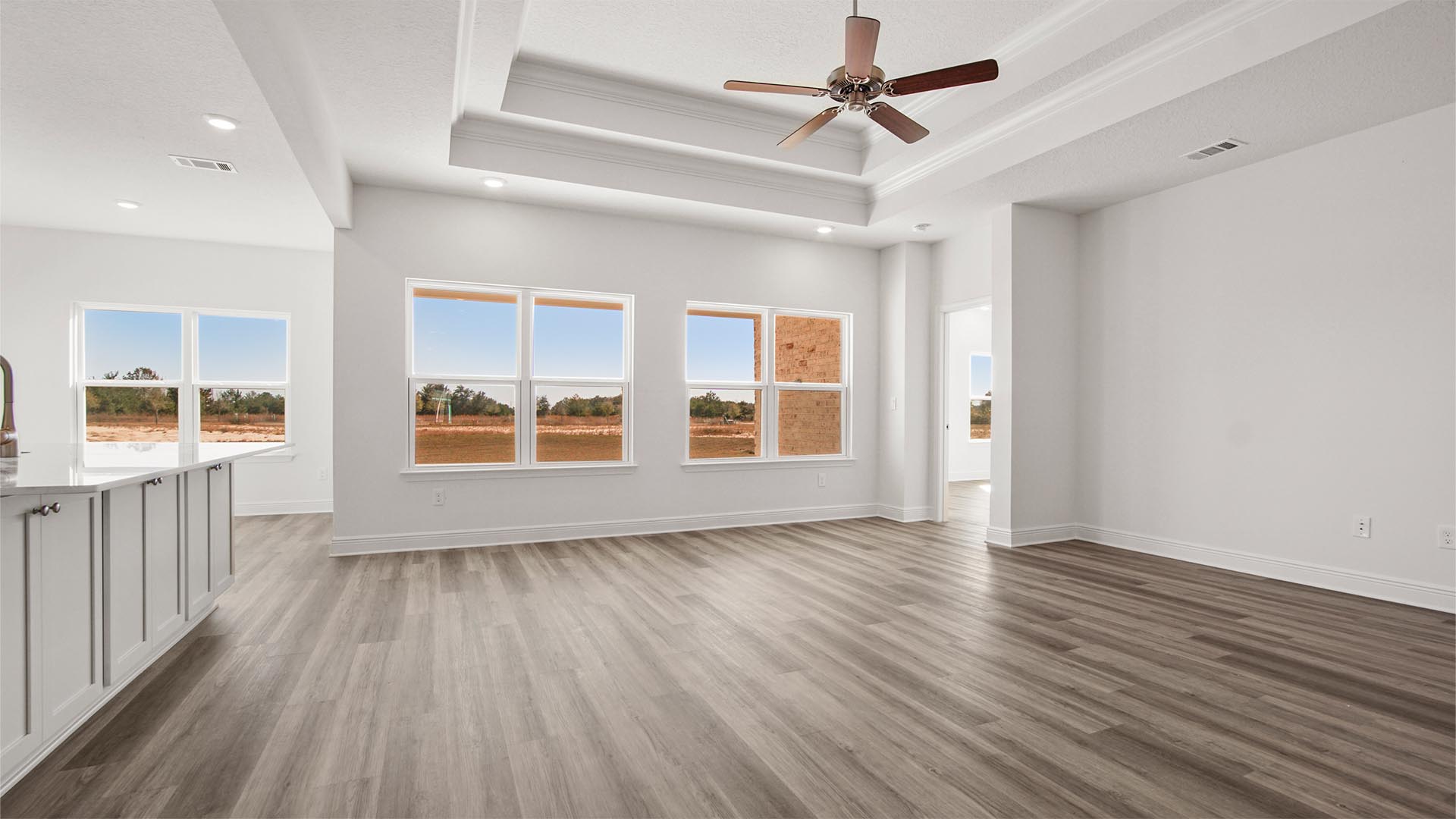 Open and spacious living area with EVP flooring