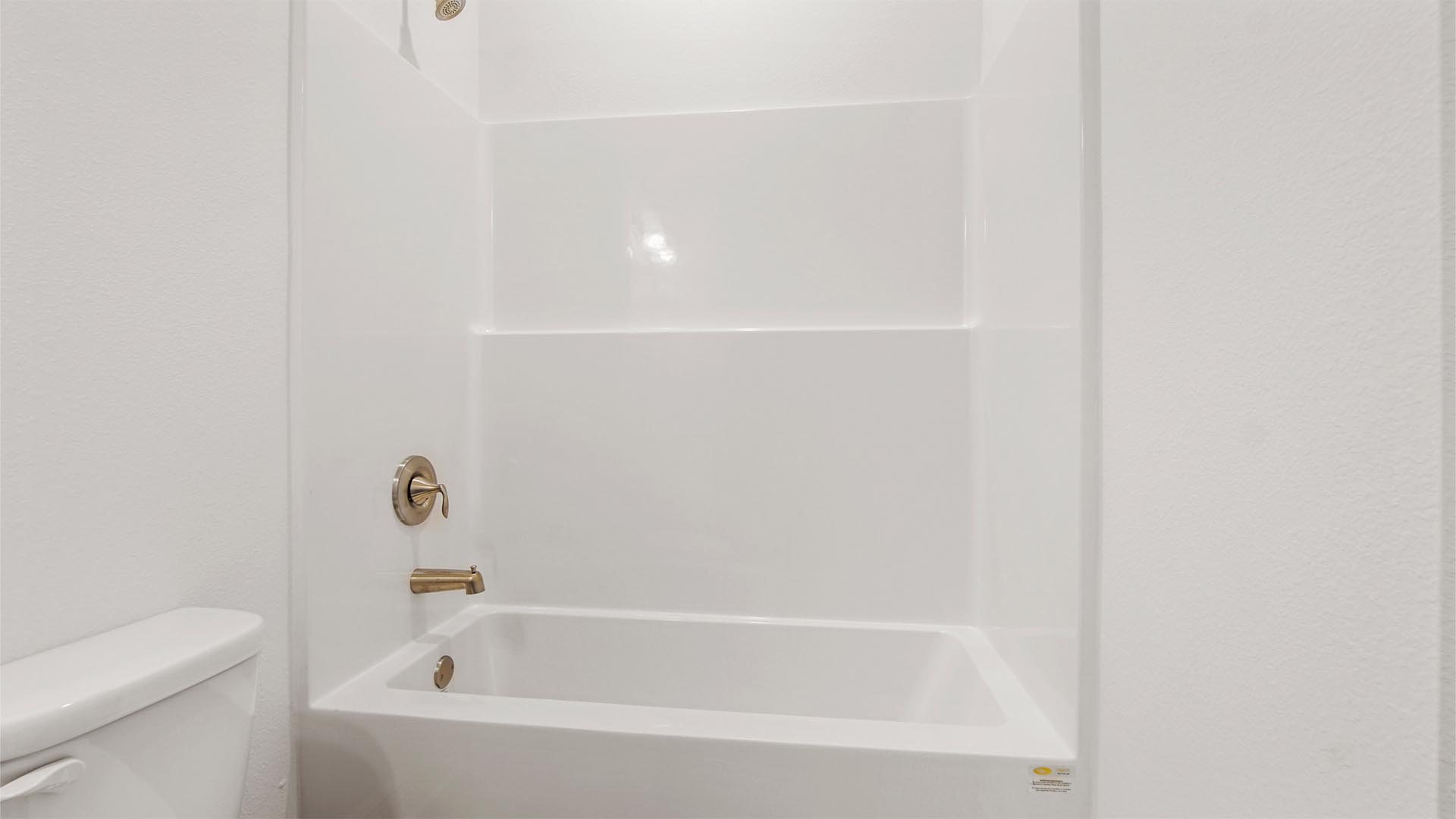 Bedroom four private bath features a shower tub combination