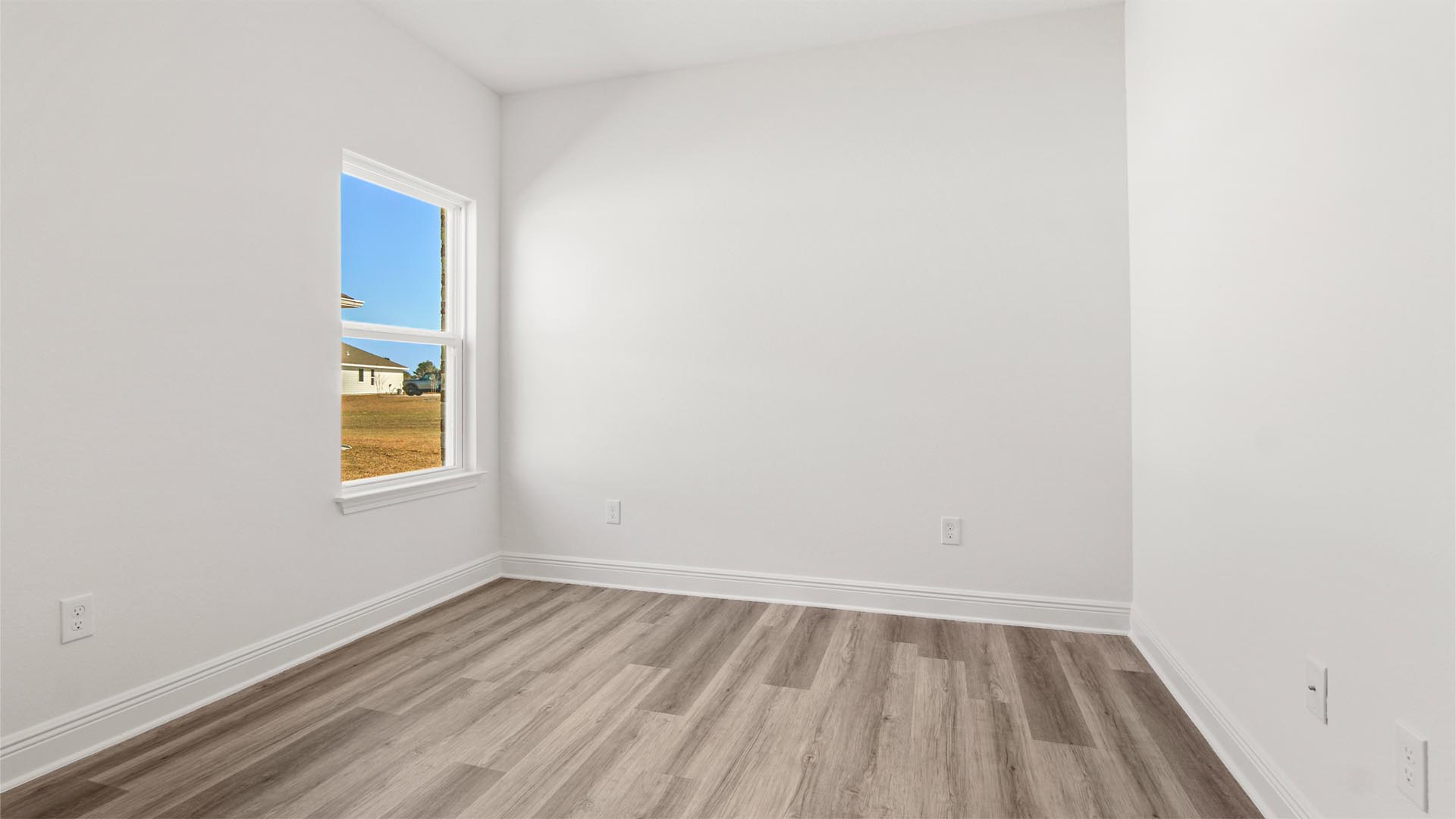 Bedroom three is spacious with EVP flooring