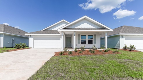 Owls Head Farms Lakeside C front of home with covered patio and picture window and two car garage