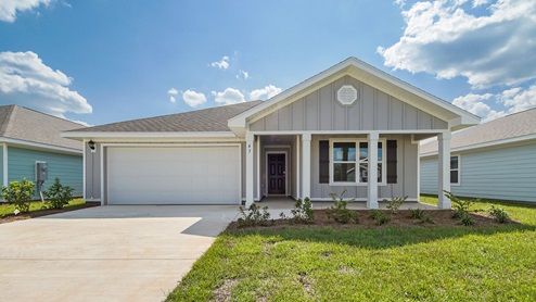 Owls Head Farms Ryder C front of home with covered patio and picture window and two car garage