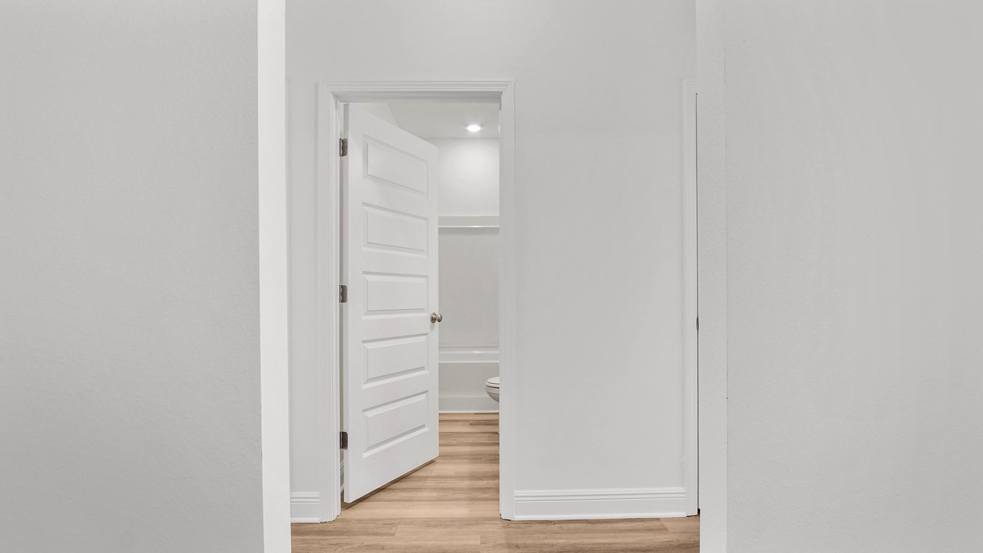 Hall to shared bathroom