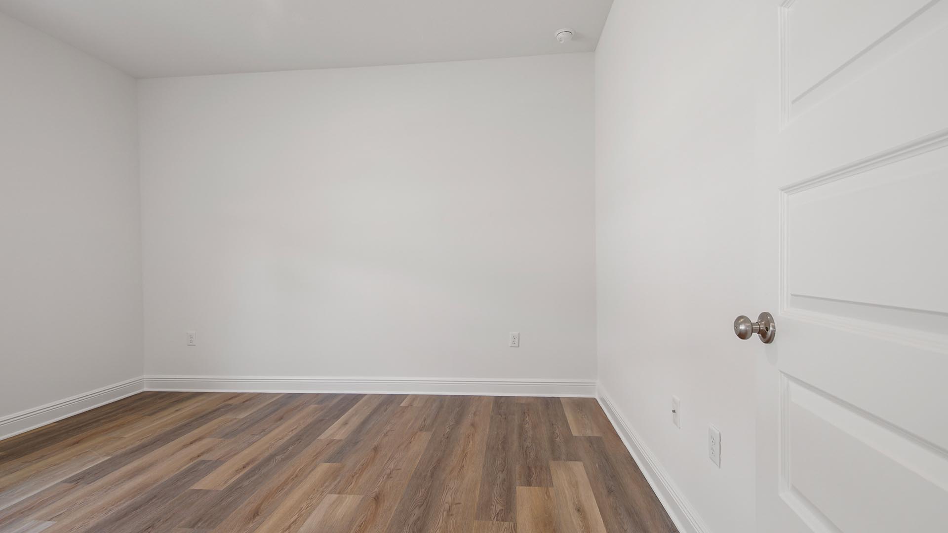 Bedroom three features EVP flooring and has plenty of space