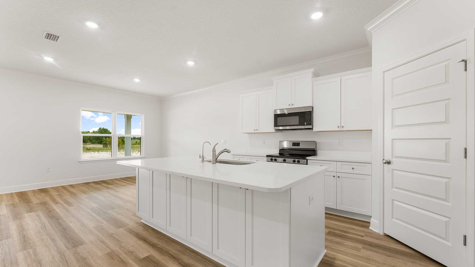 Open concept living area with EVP flooring