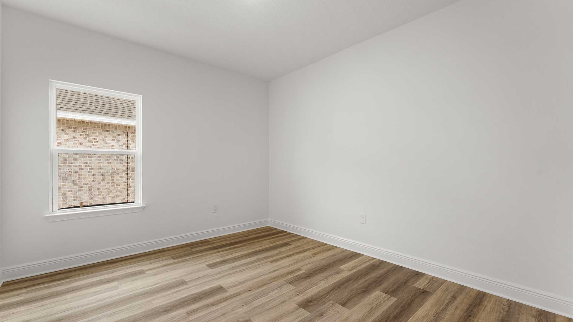 The guest bedrooms have EVP flooring