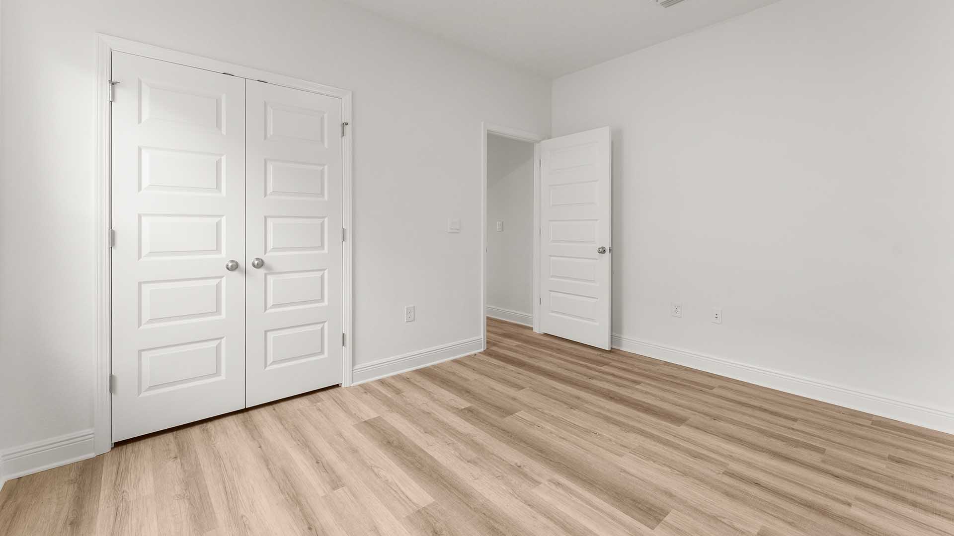 Guest bedroom three has ample closet space