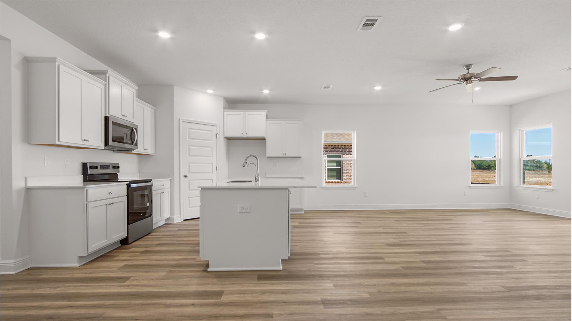 Spacious kitchen with center island and large living and breakfast area