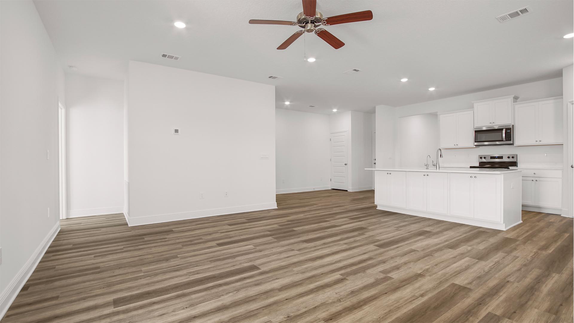 The primary bedroom is located off the living area