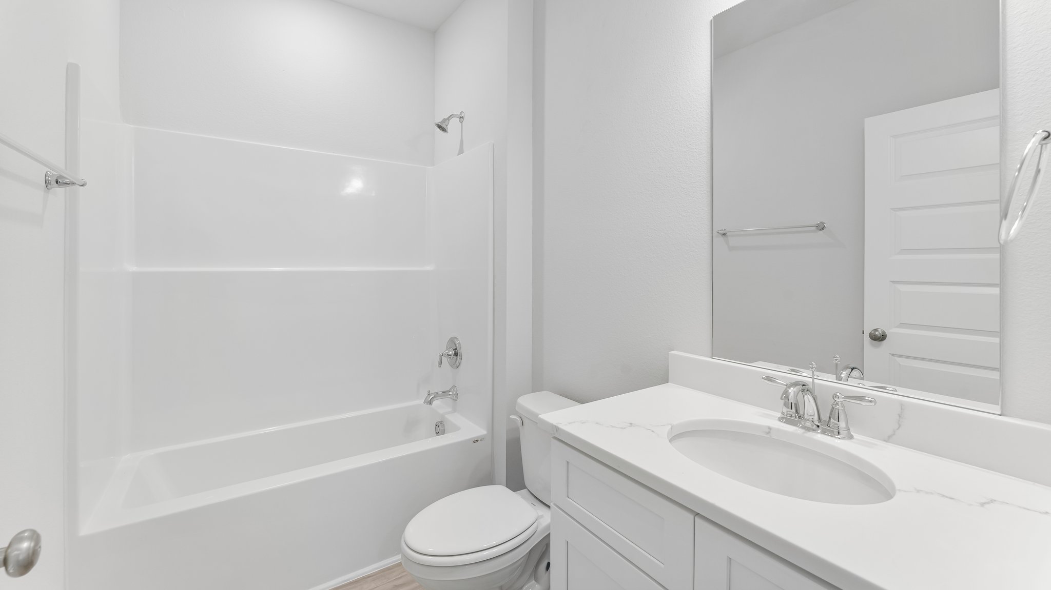 There are two shared bathrooms between the four additional bedrooms