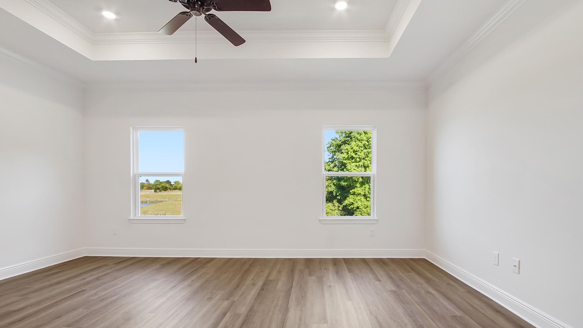 The primary bedroom has EVP flooring