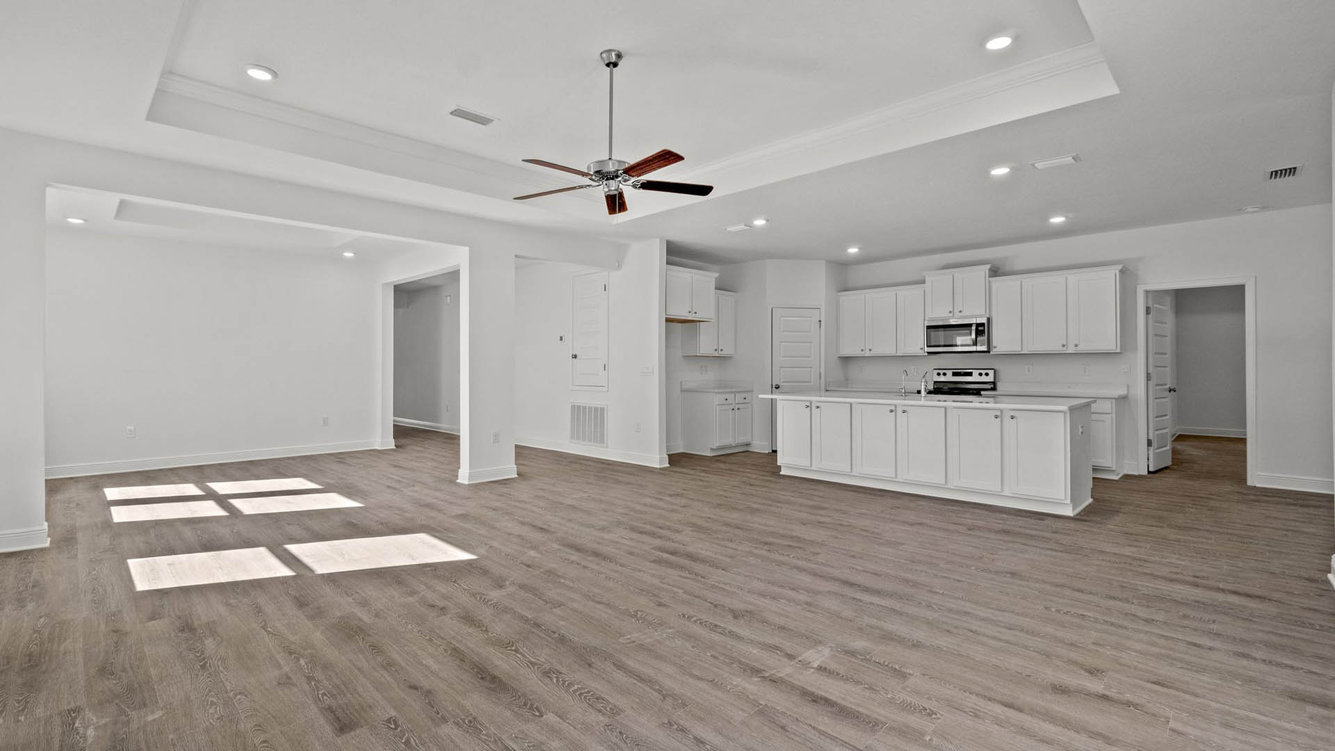 The Camden has traditional 9 foot ceiling with try celing in the living room