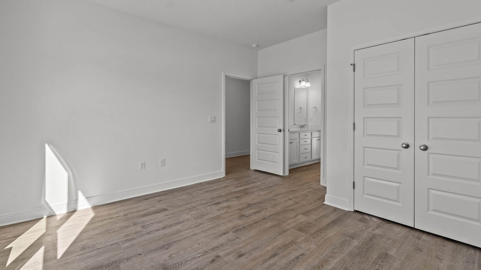 Bedroom four with EVP flooring and large closet