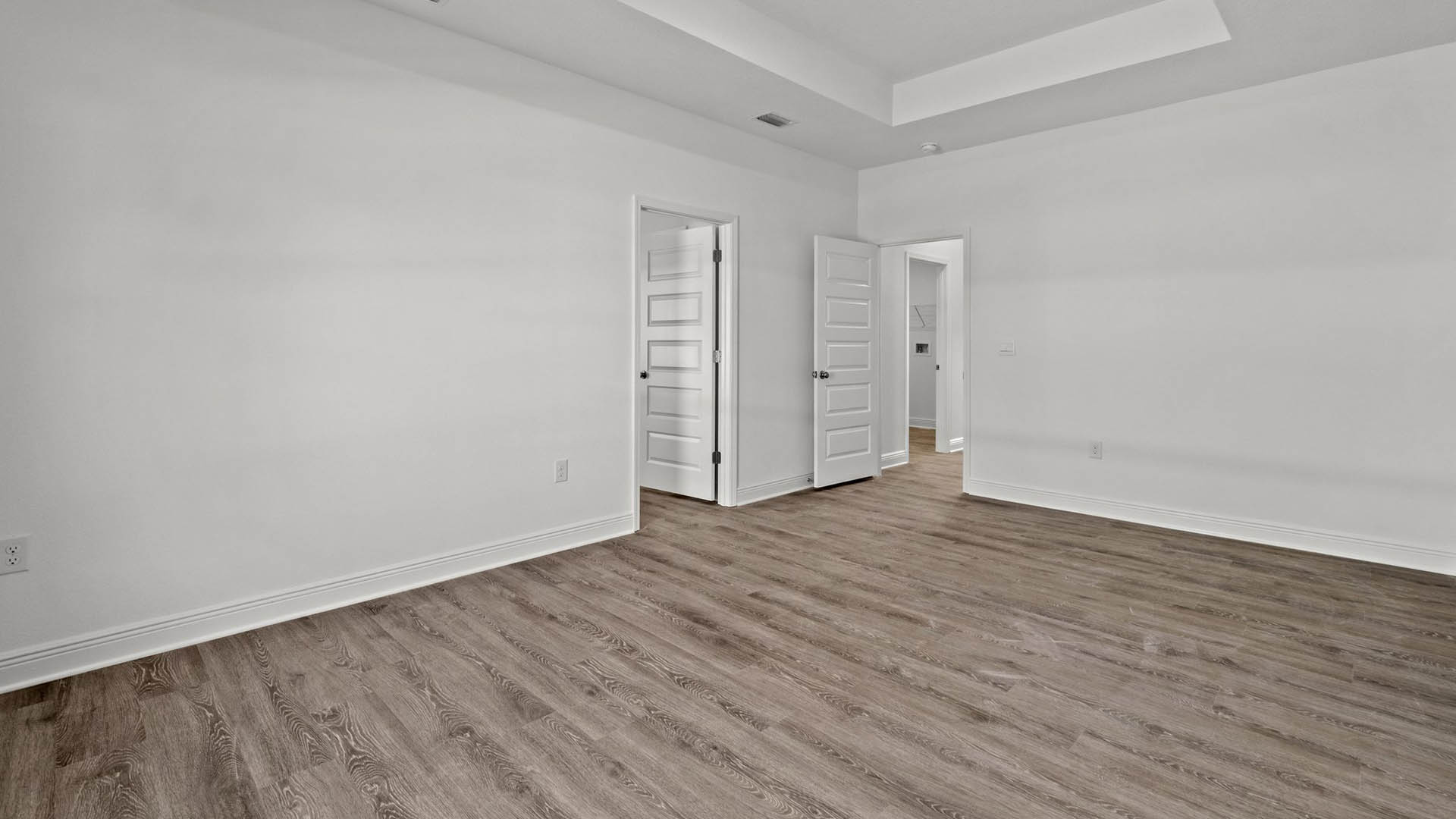 The study has EVP flooring and trey ceilings