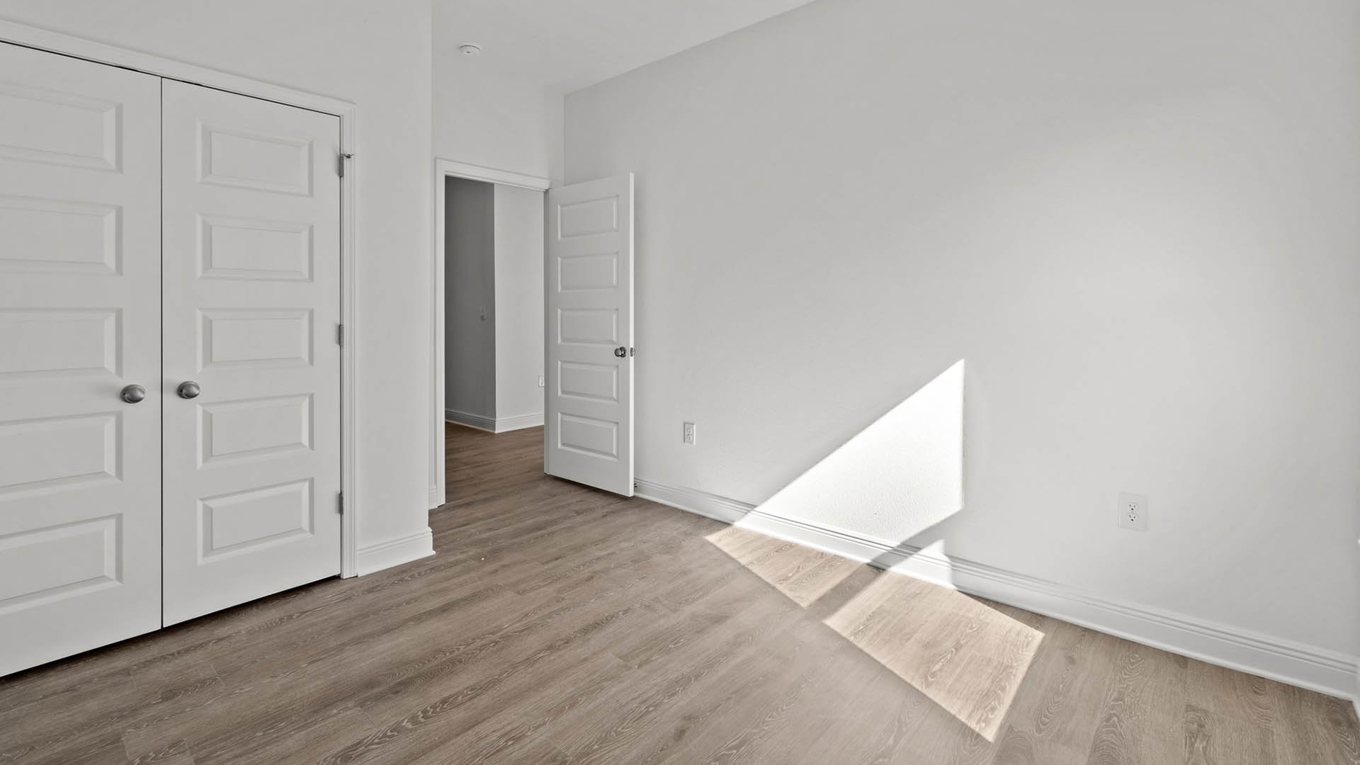 Bedroom three has a spacious closet and EVP flooring