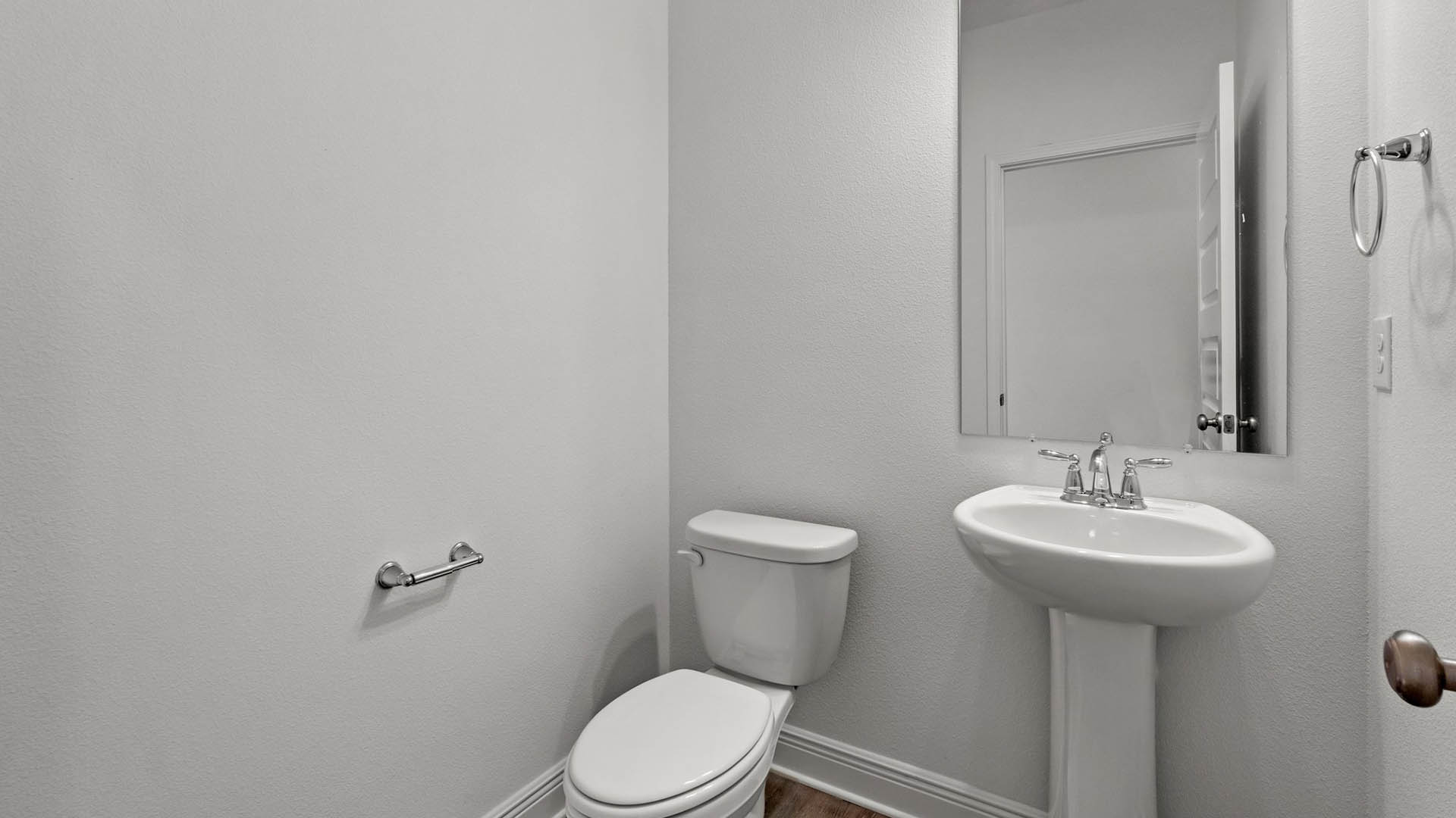 The Camden features a powder bath just off the hallway off the foyer