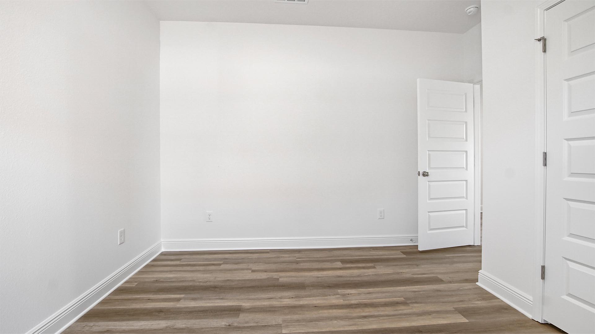 Bedroom two is spacious and features EVP flooring