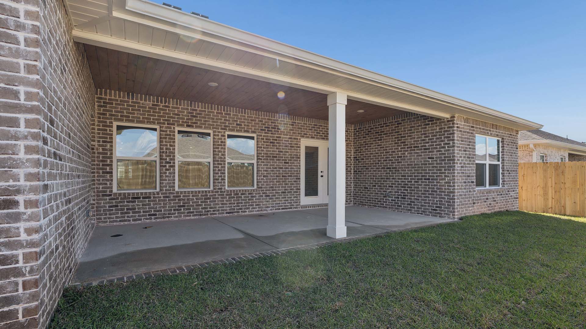 Covered patio at the back of the home