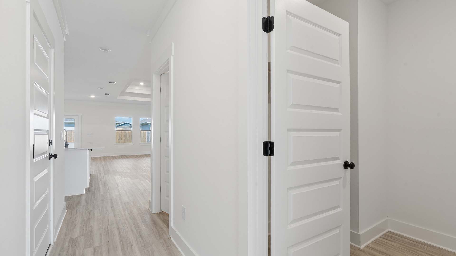 The foyer leads to an expansive living area