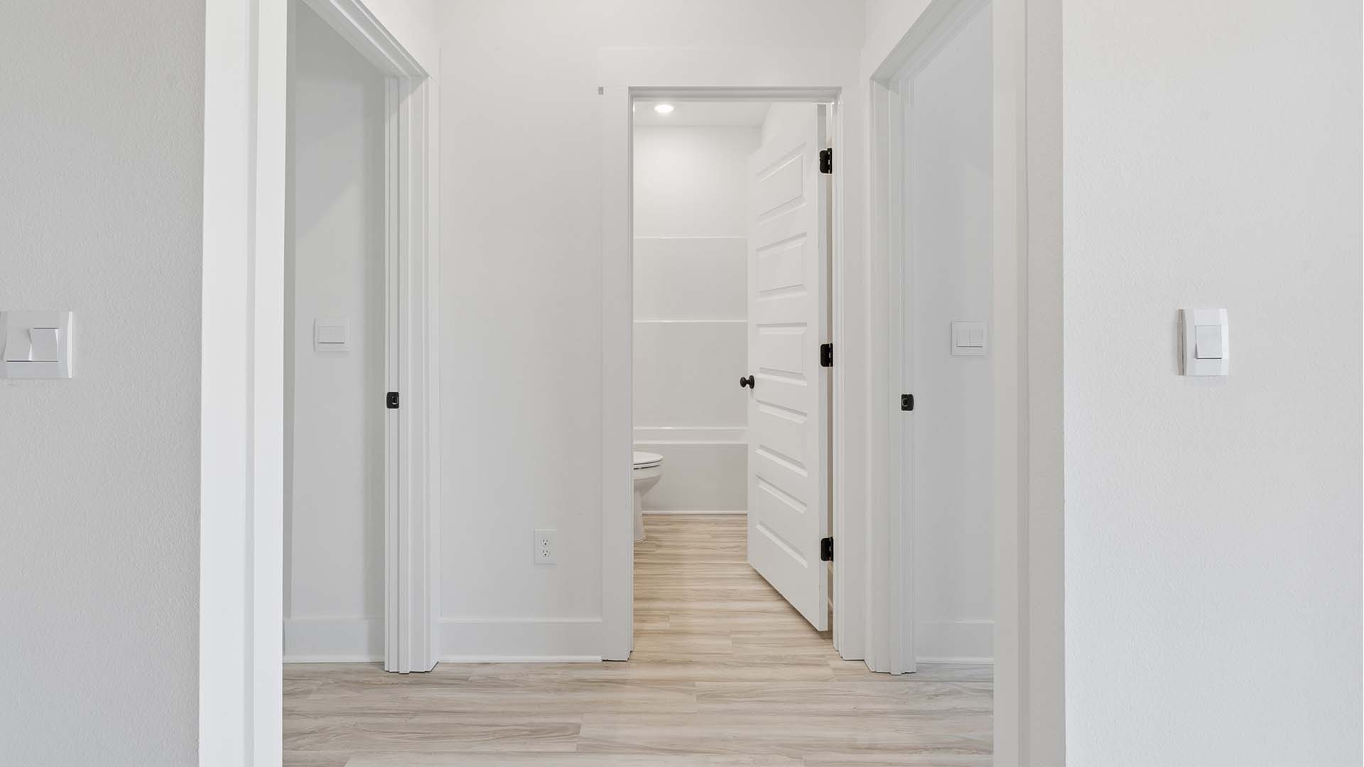 Bedrooms four and five are located off the living area