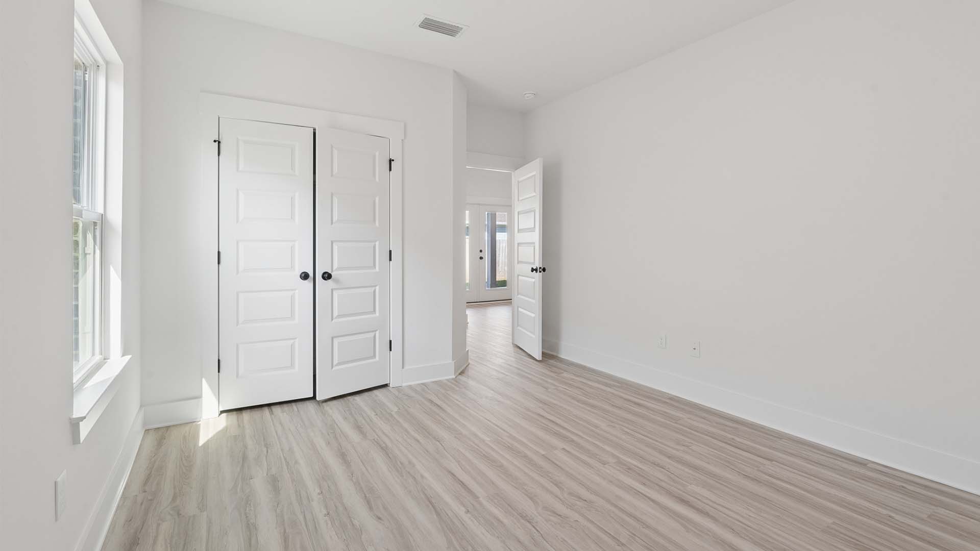 The bedrooms have EVP flooring