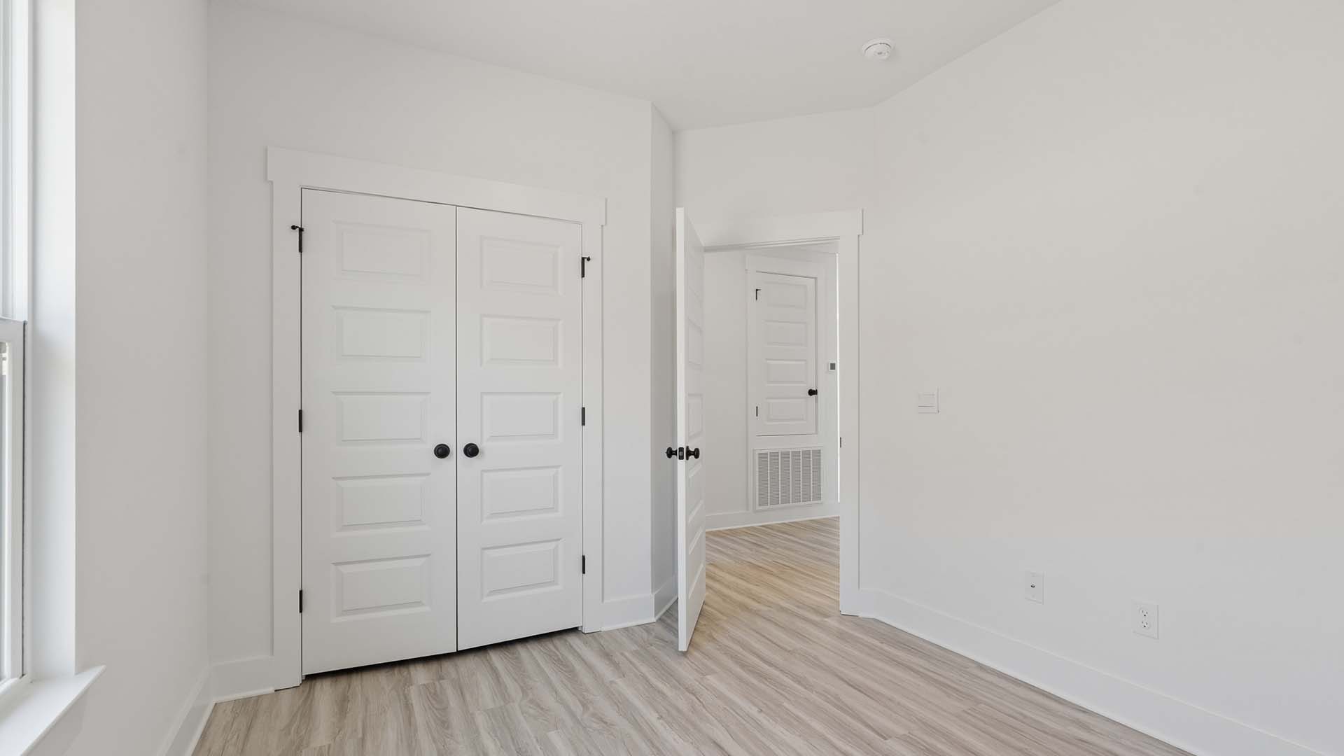 Guest bedrooms are well lit with natural light