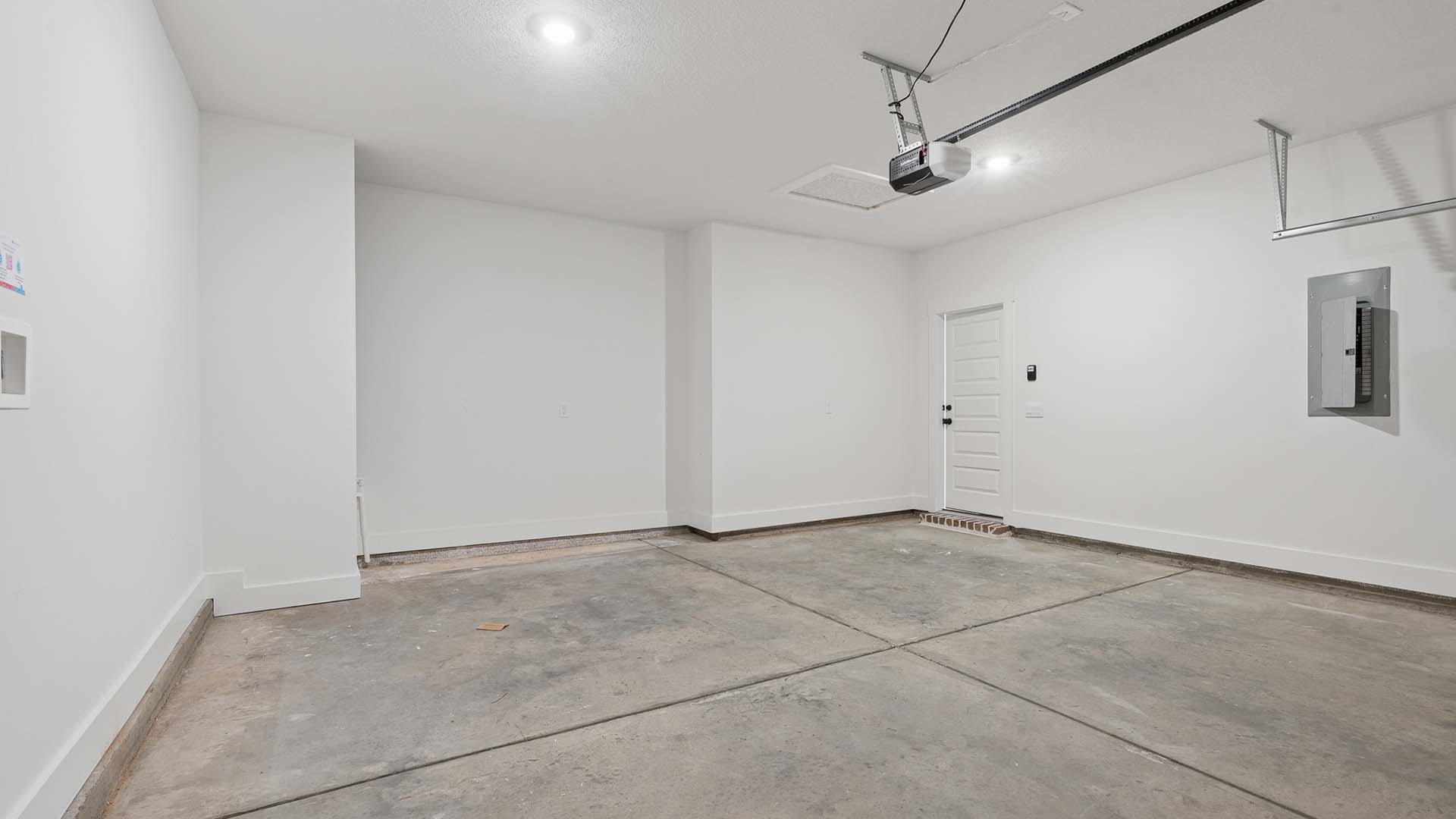 The Mckenzie has a two car garage with remote entry