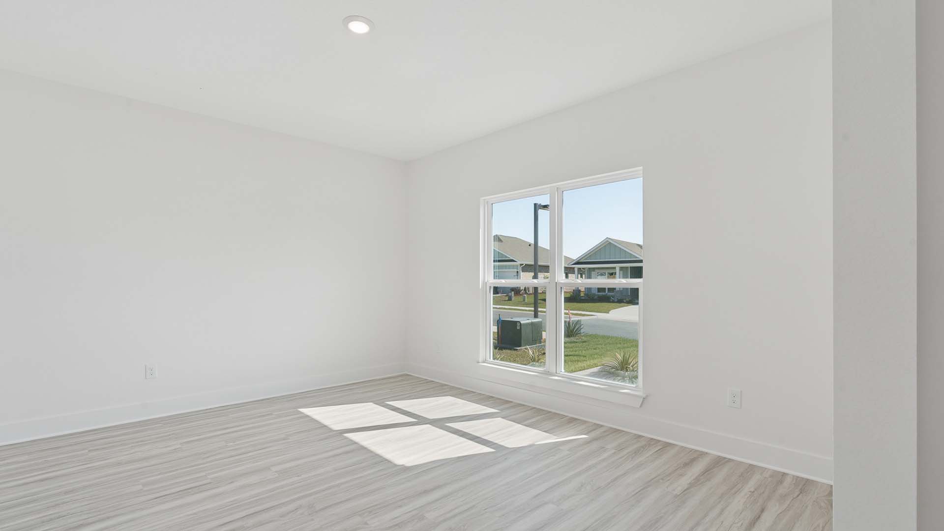 The study has a large window that allows for natural light