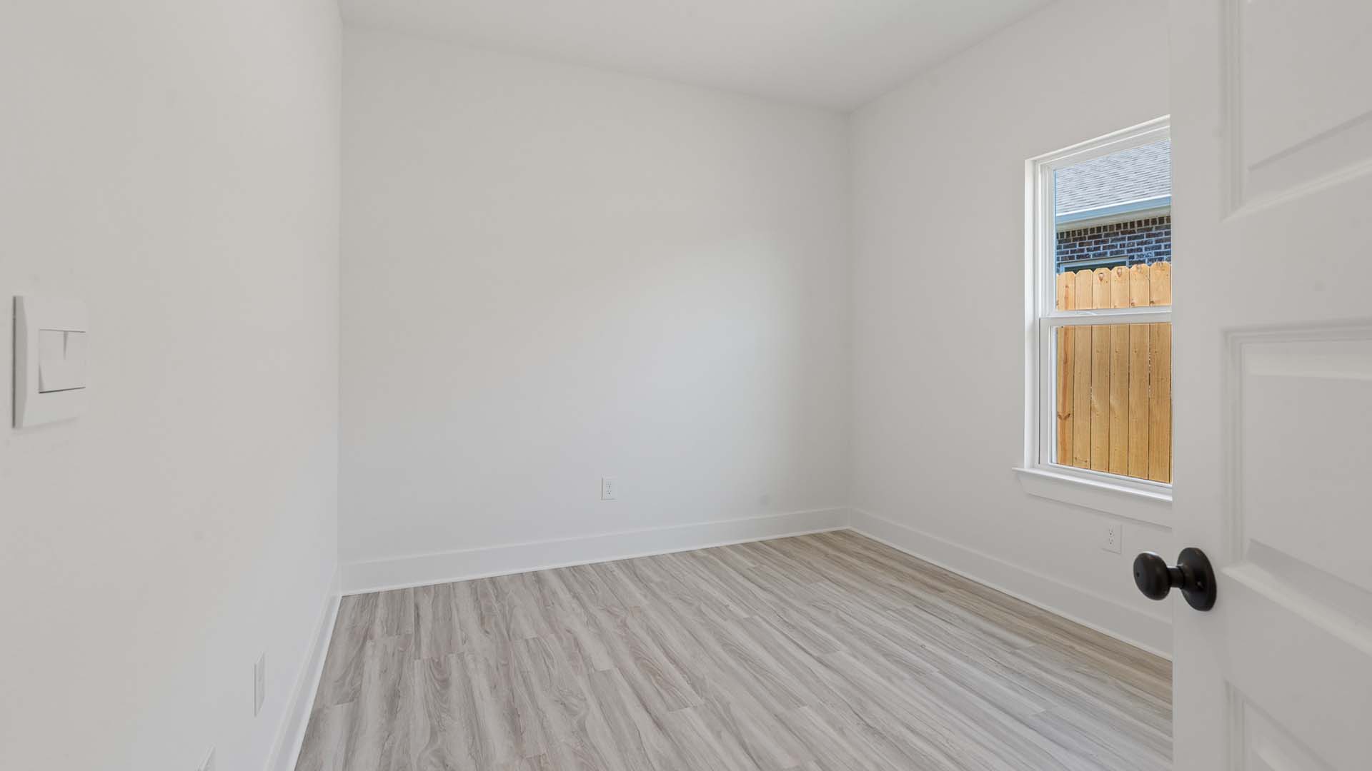 Guest bedroom two has a window for natural light