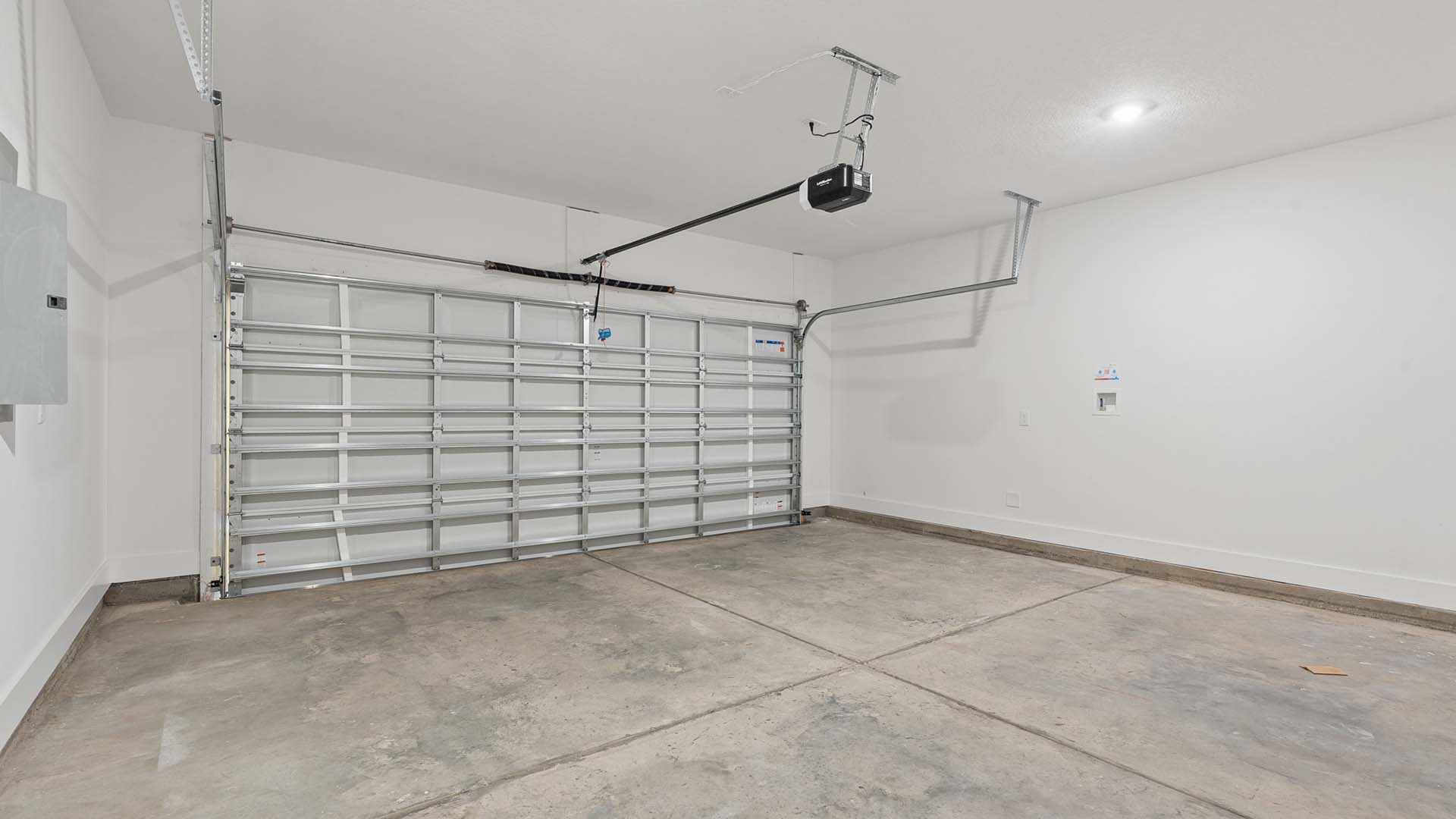 The two car garage has remote entry