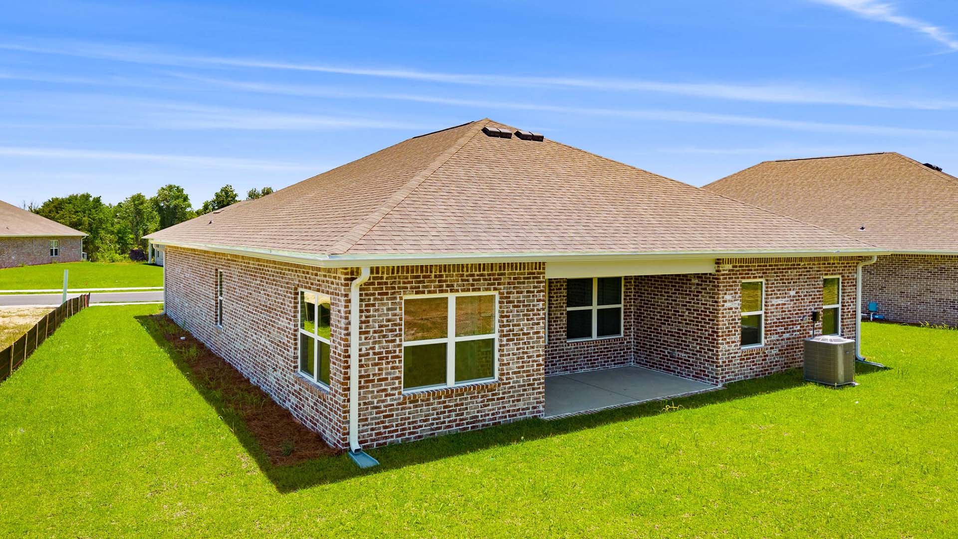 There is a covered back patio for a dining area