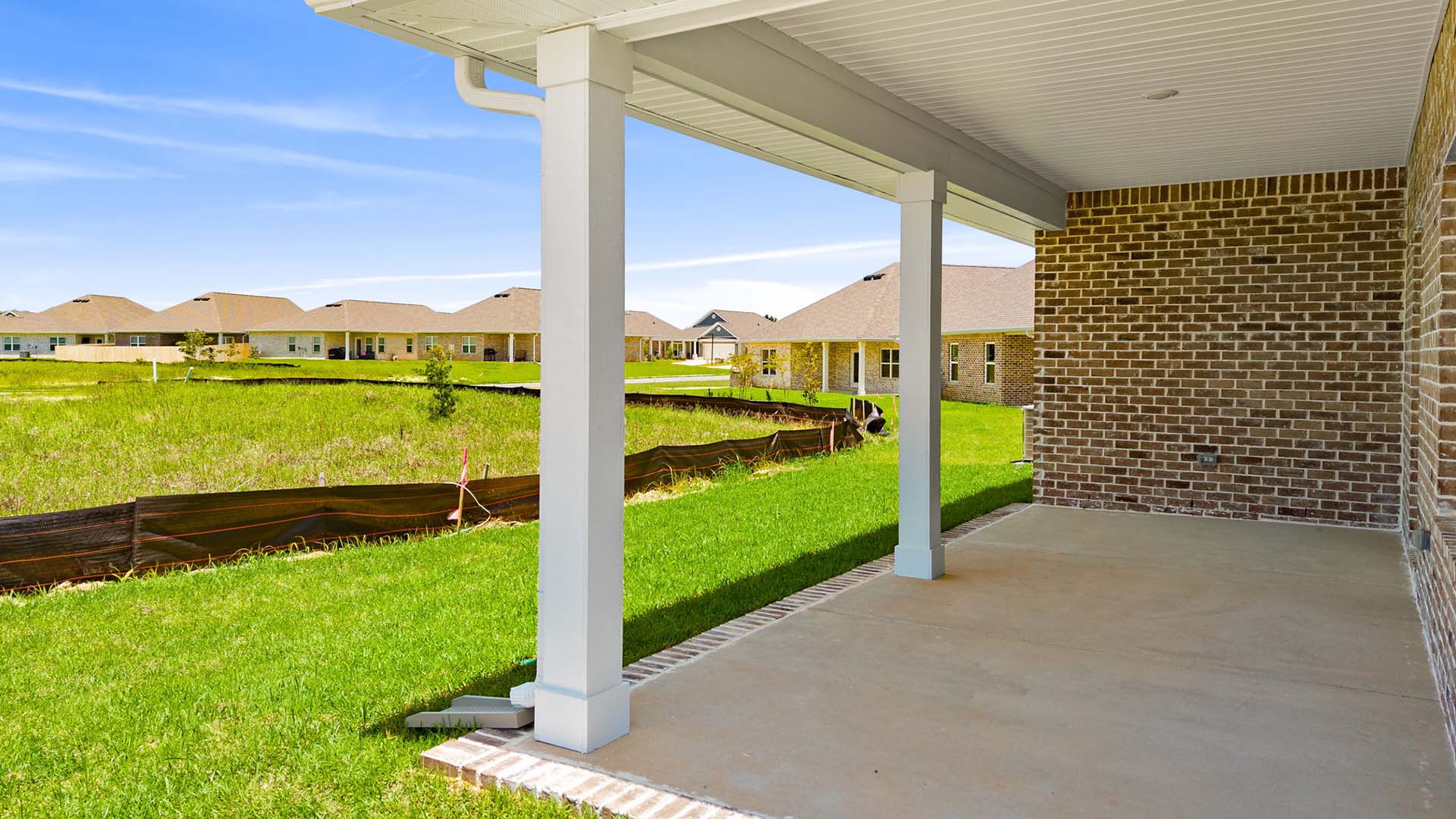 The back patio has space for a dining table and sitting area