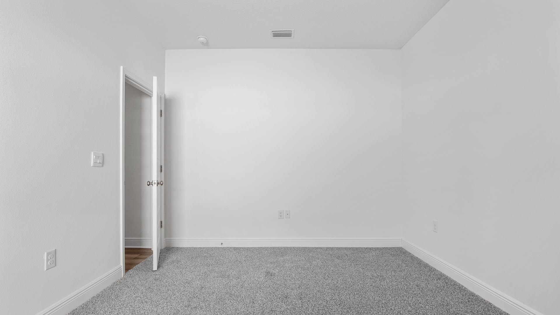 Bedroom three has plush carpet