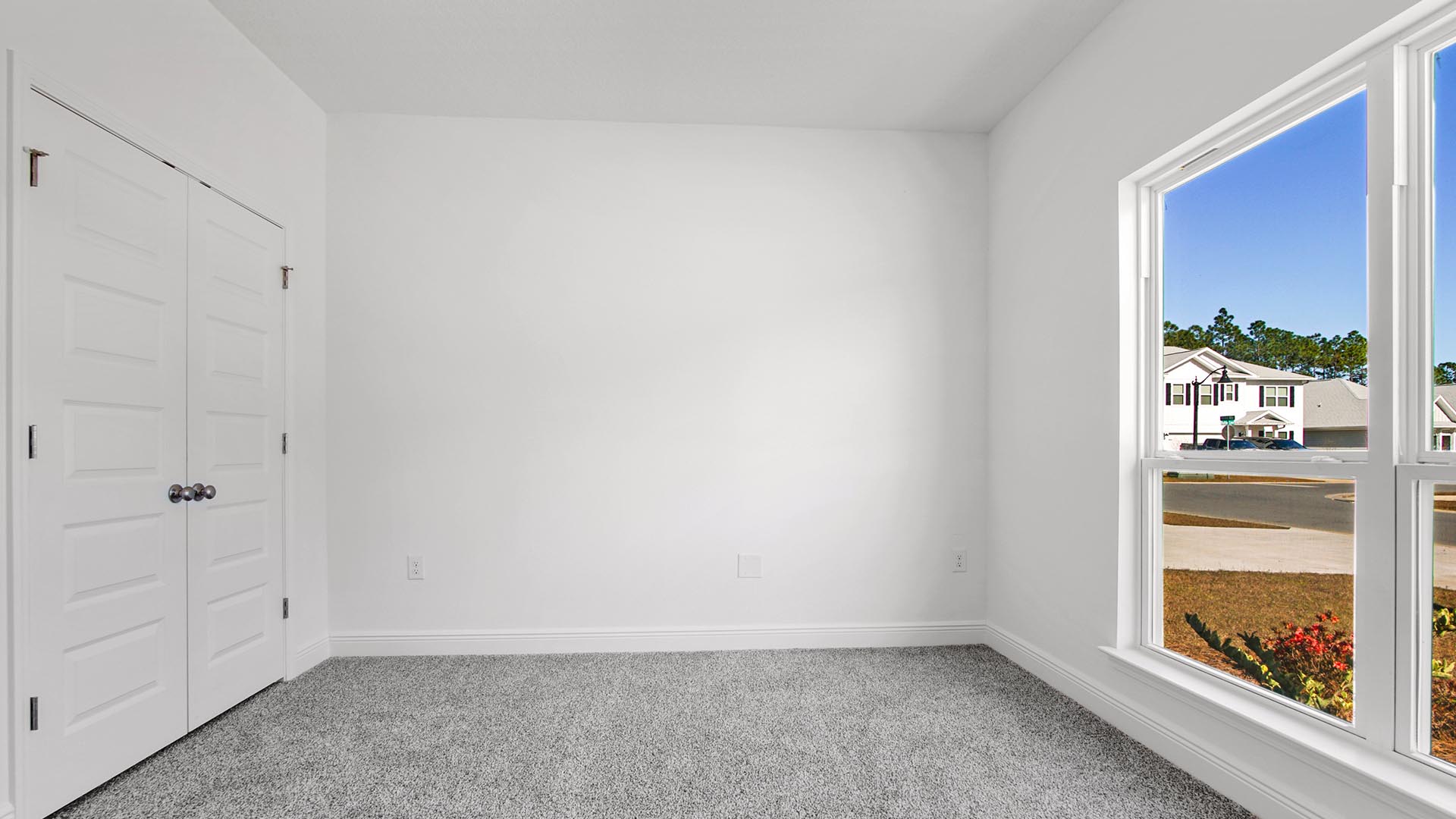 Bedroom two has a large picture window