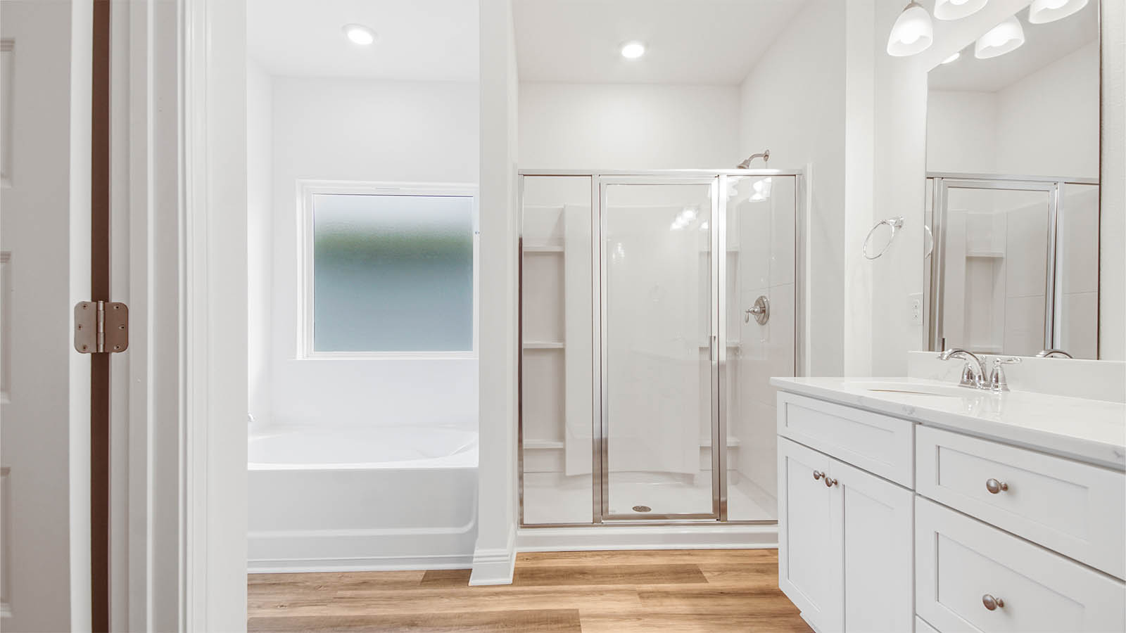 The primary bathroom has a separate shower