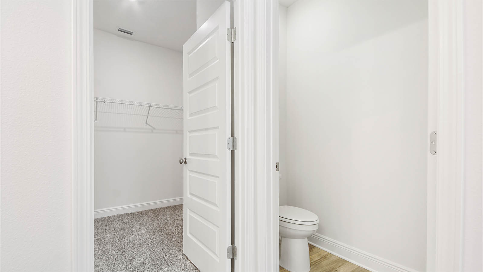 The primary bathroom has a separate water closet for privacy