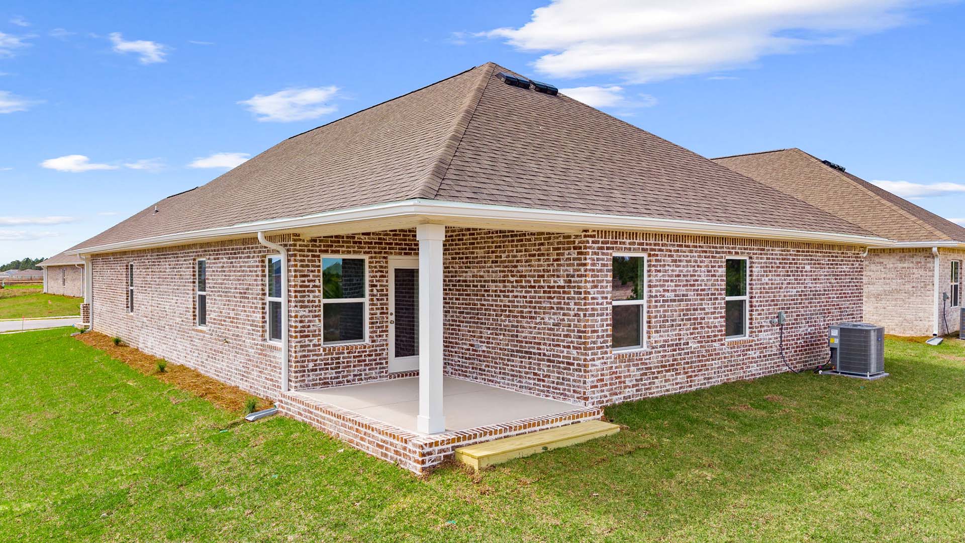 This home has three sides full brick and covered back patio