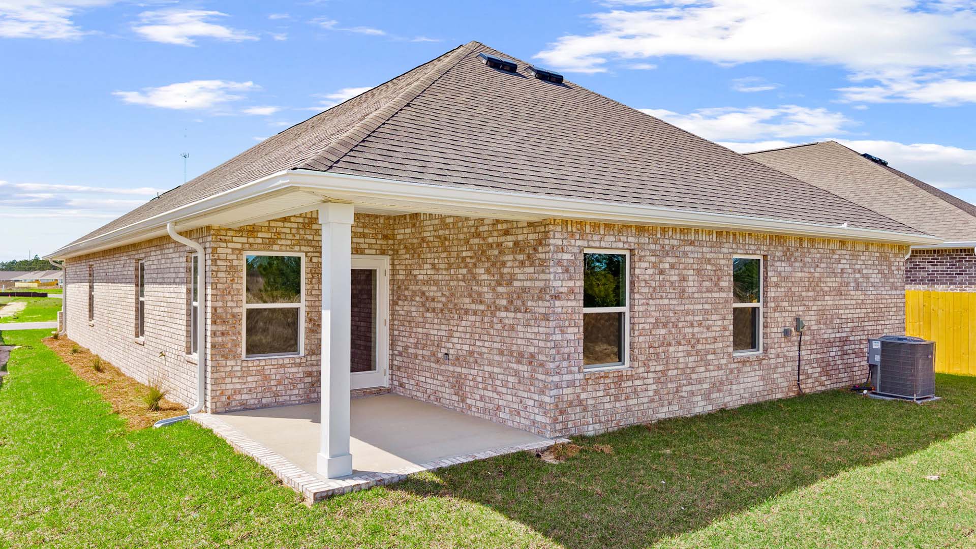 There is a covered back patio with space for dining area