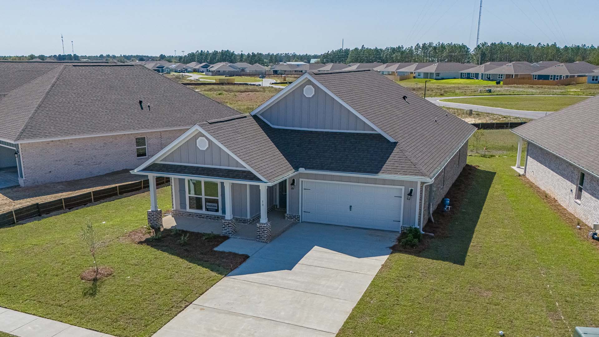 The front has a covered patio