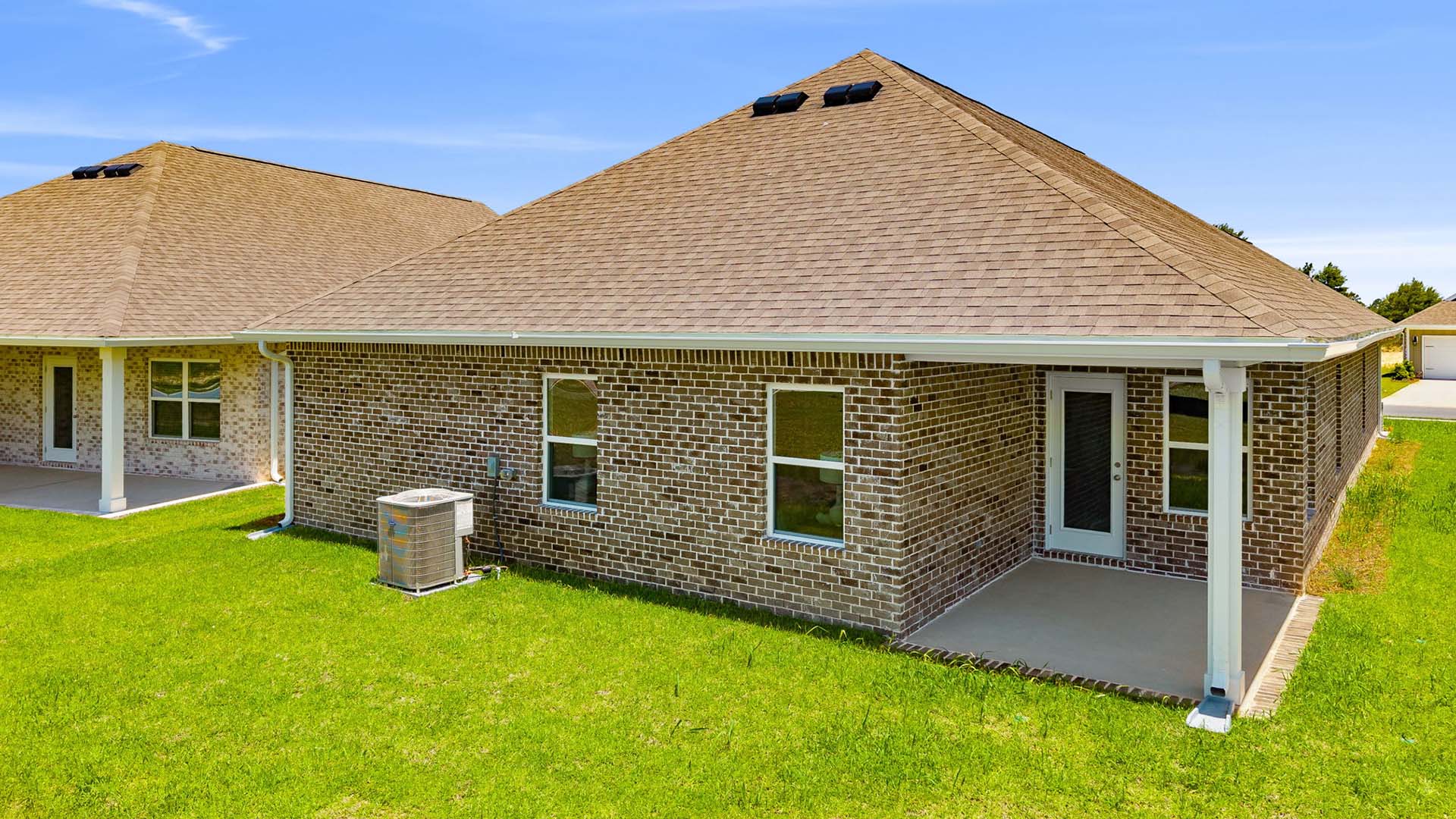 There is a covered patio at the back of the home