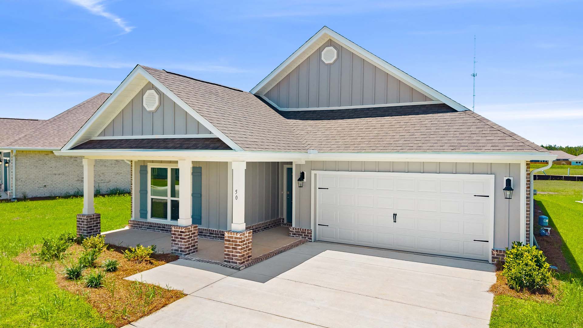 The front has a covered patio