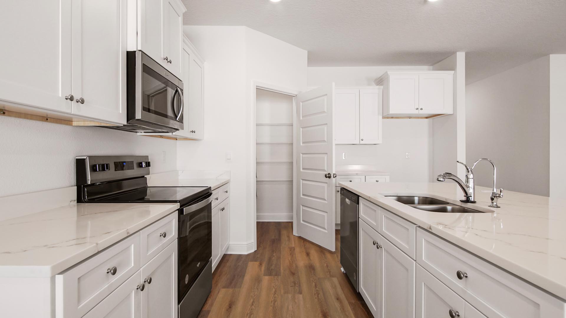 There is a corner pantry in the kitchen