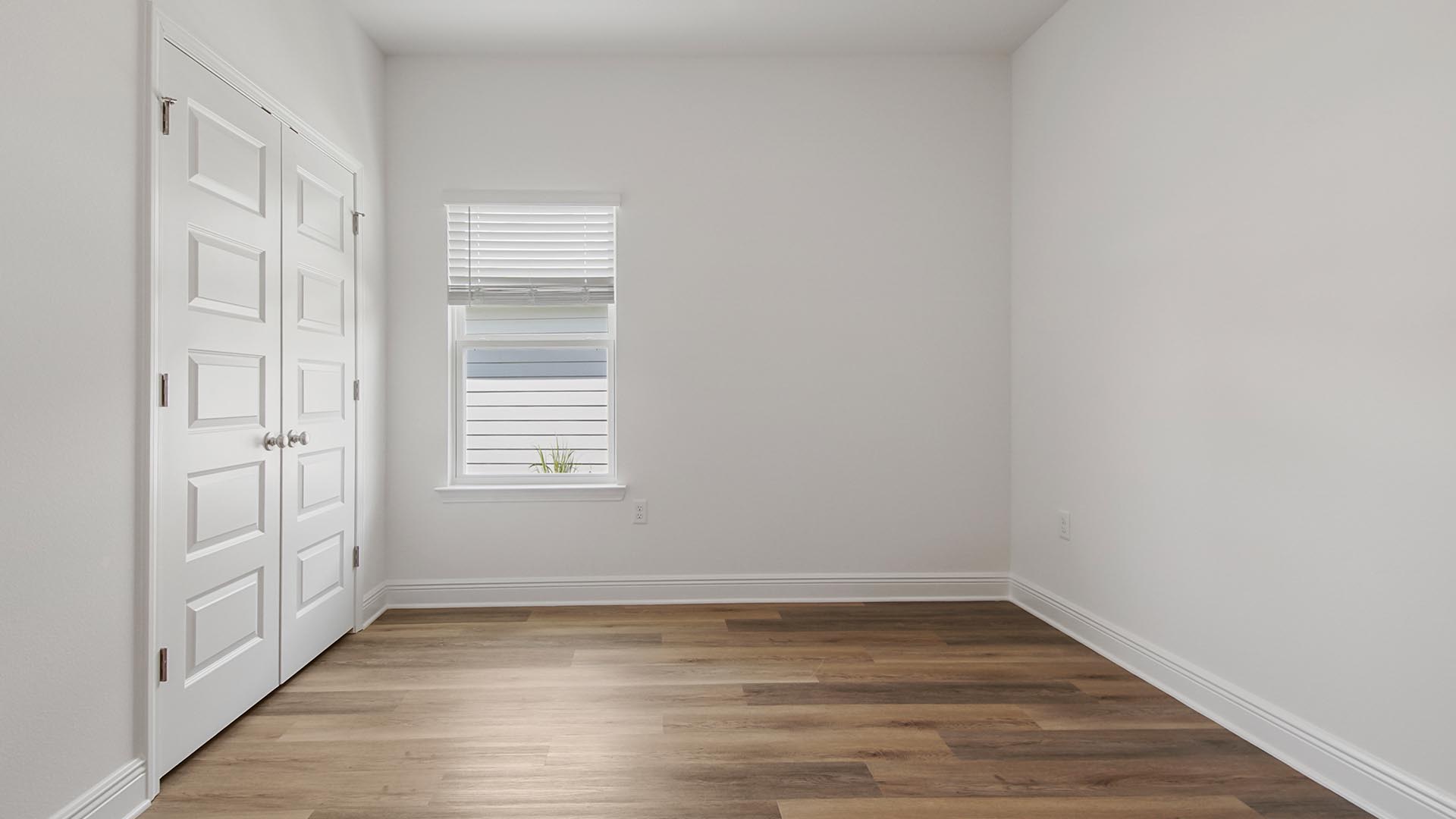 Bedroom three has a double door closet