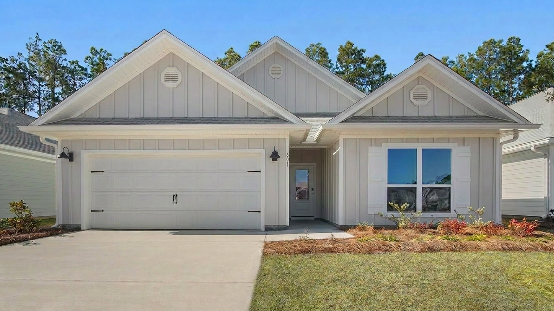 247 Dama Del Mar Way is under construction, This image shows a completed home with Pearl Grey Hardie siding