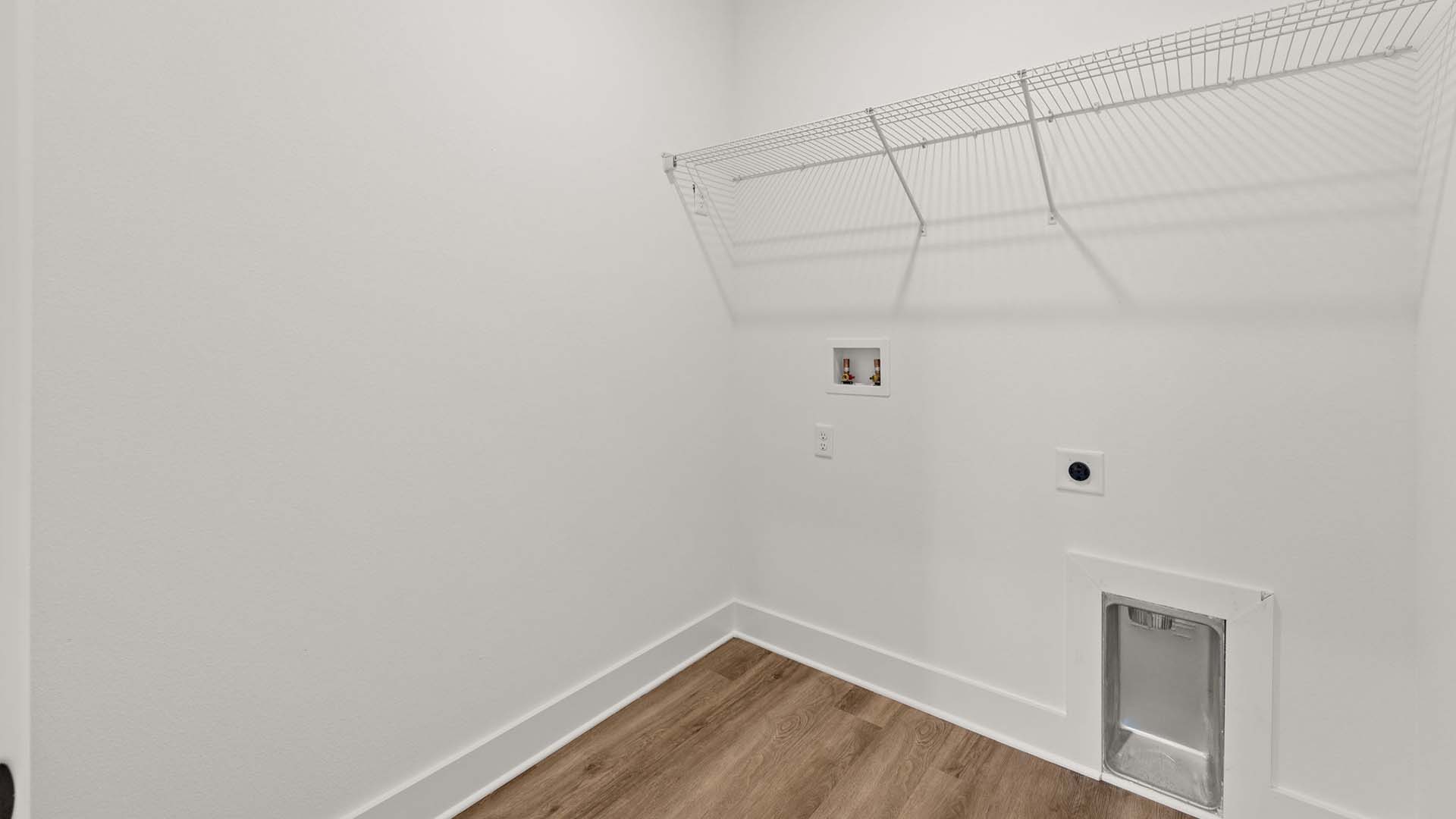 The laundry room is located near bedrooms two and five