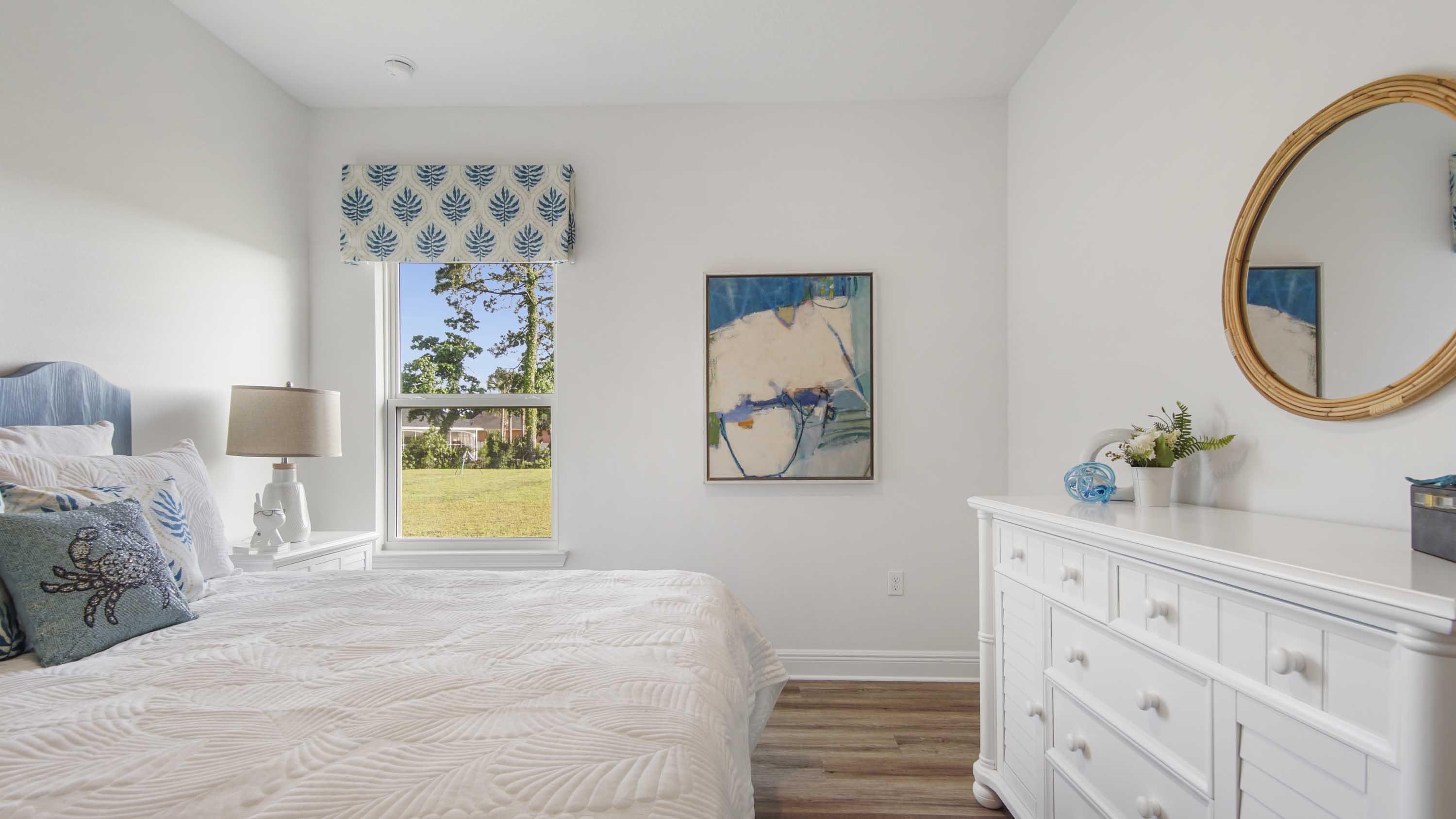 Third of four guest bedrooms with a spacious closet