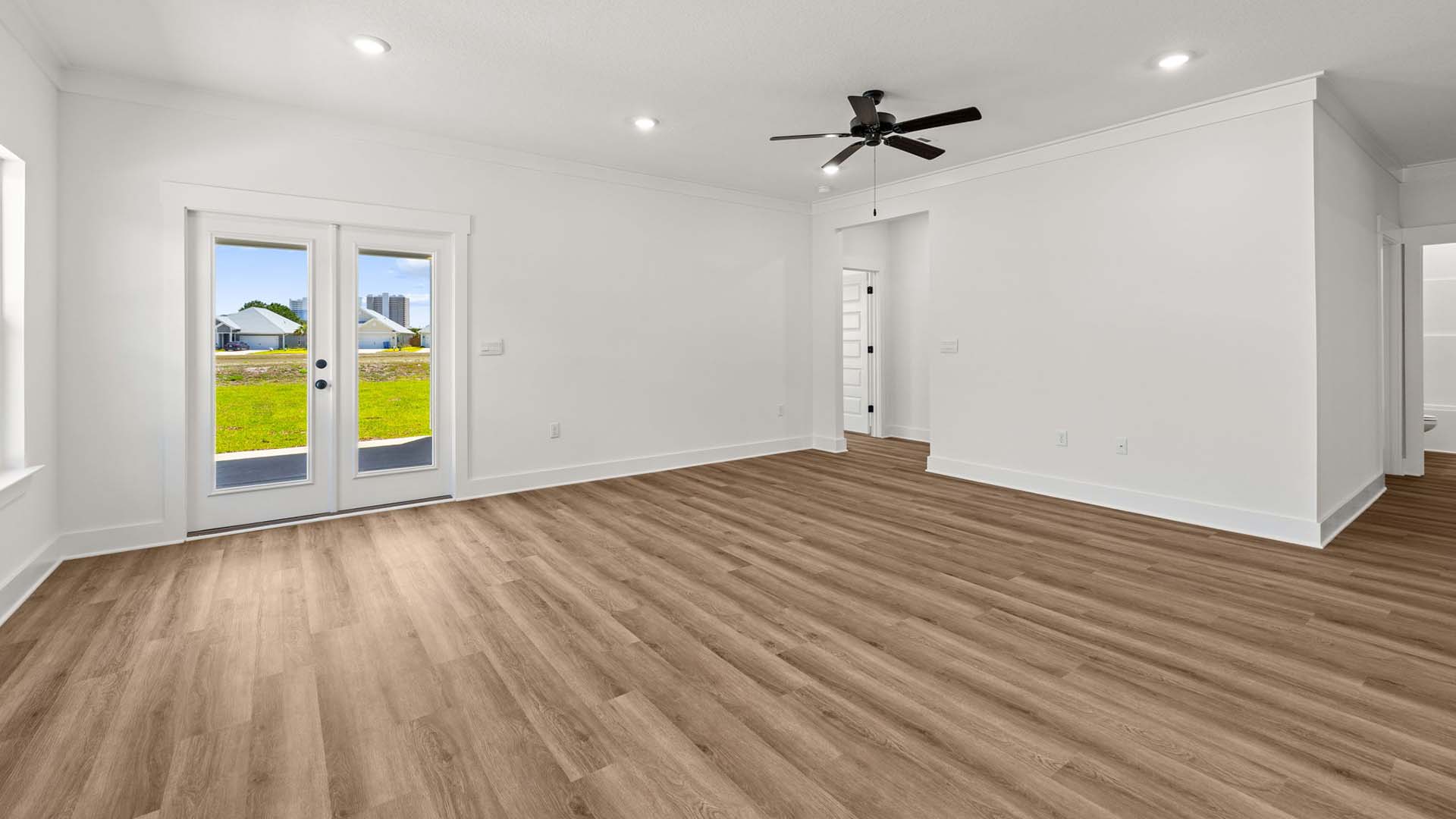 The primary bedroom is at the back of the home