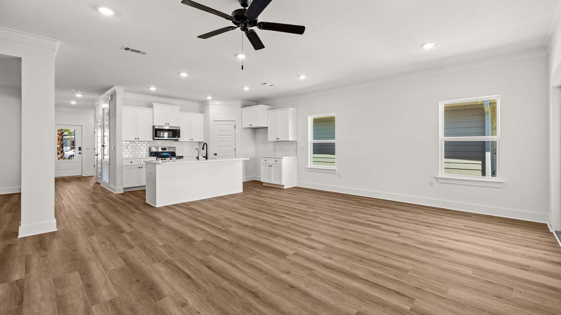 The open living area has EVP flooring throughout allowing for a seamless transition