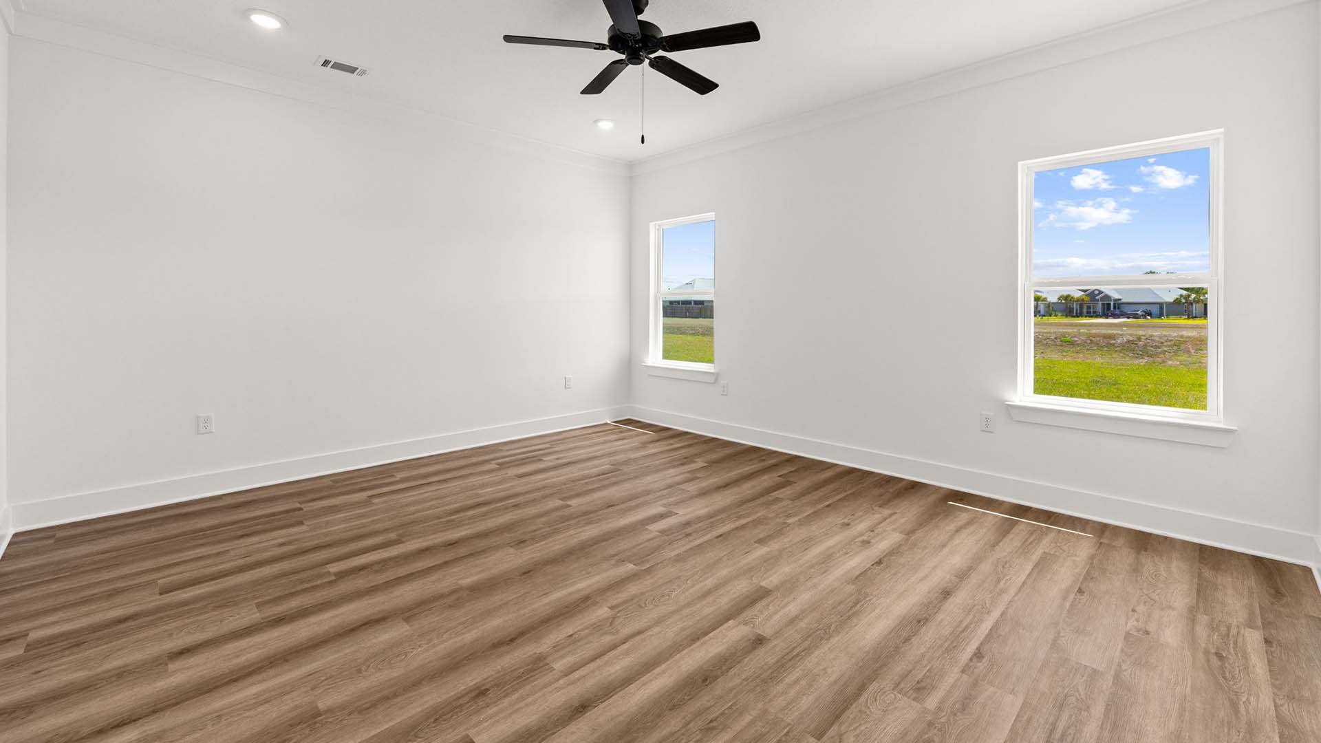 The primary bedroom has EVP flooring