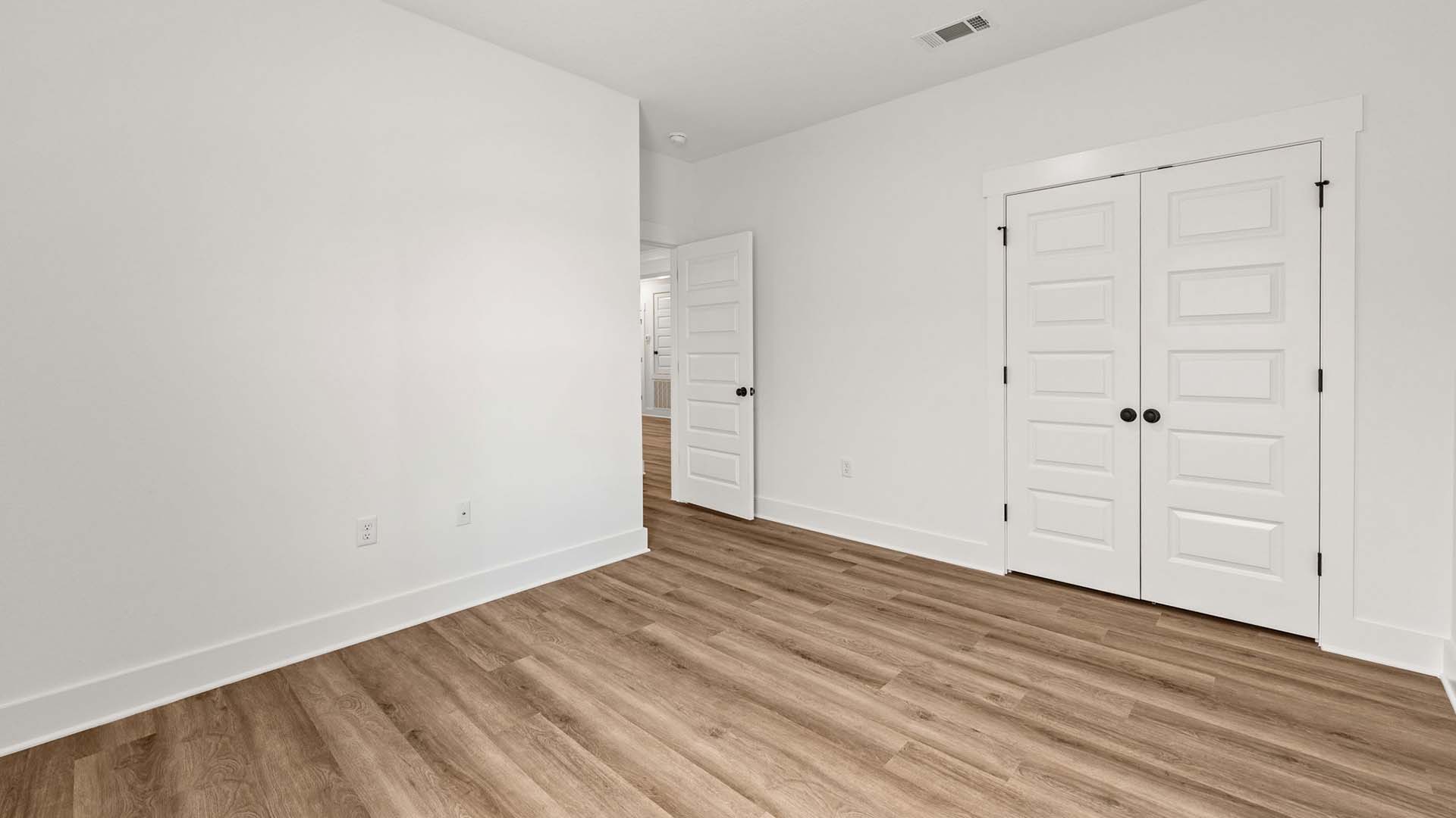 Bedroom two is located off a separate hall and ample closet space