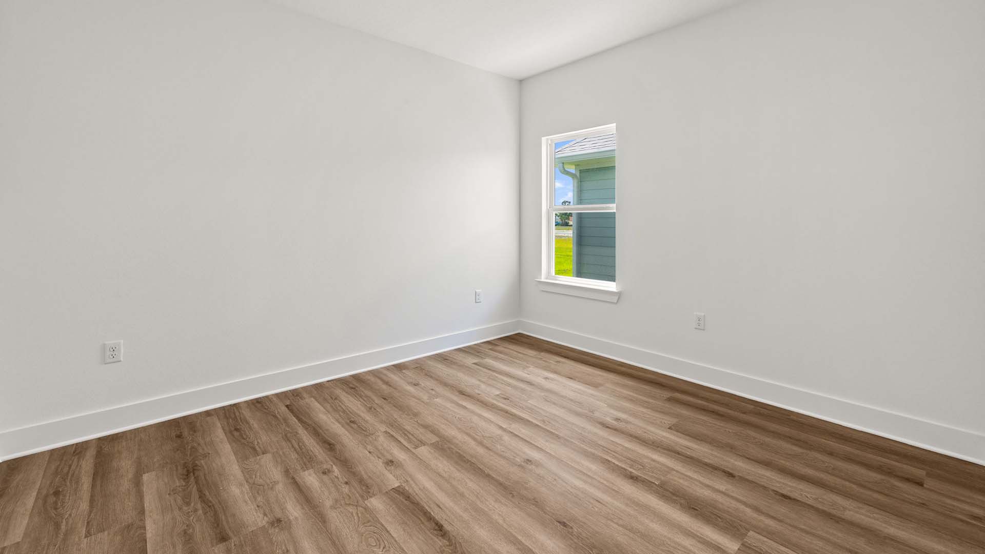 Bedroom two has EVP Flooring